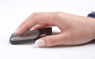Illustration for article titled MoGo Mouse X54 Fits Media Functions, Scroll Pad Into Small Package